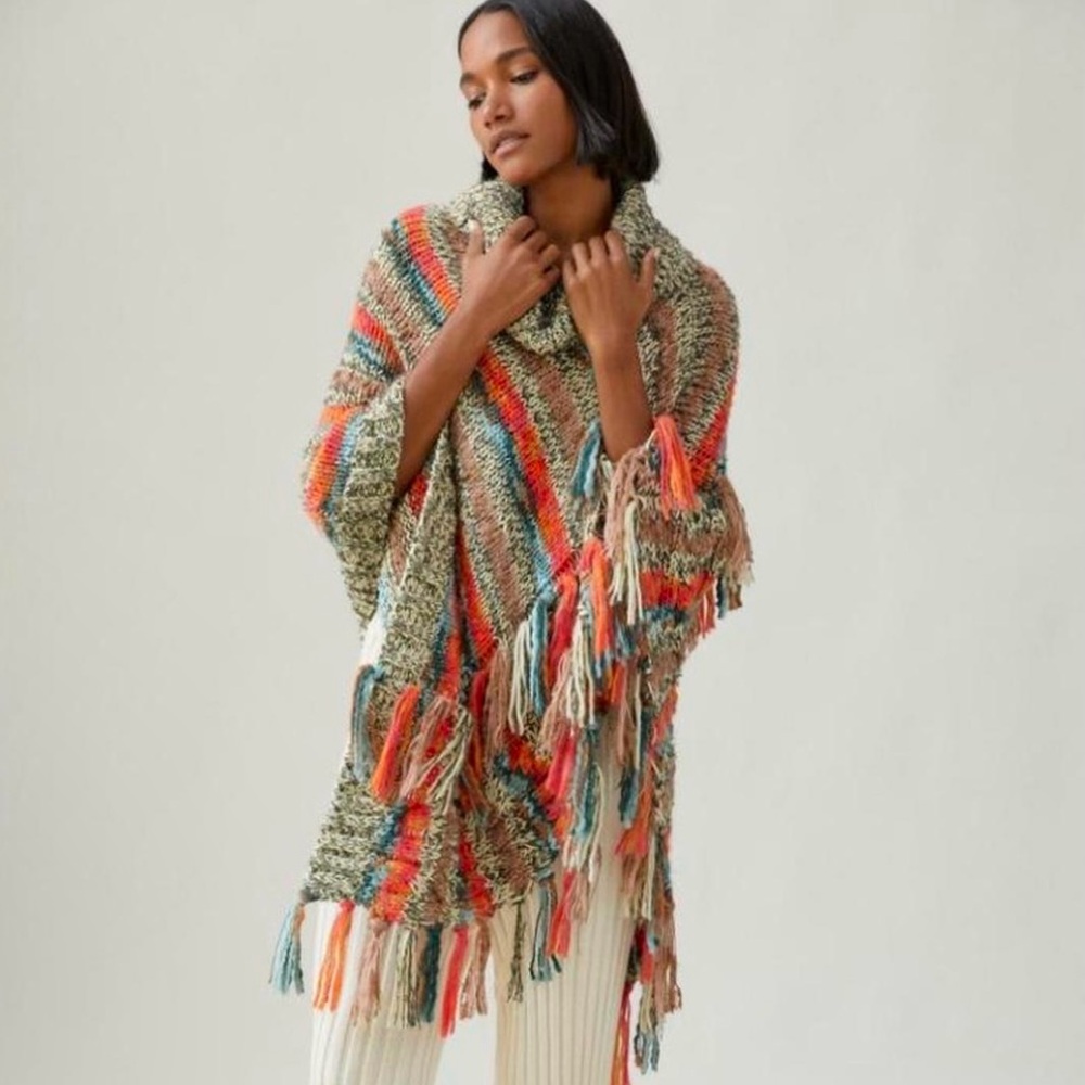 Anthropologie Tasseled Turtleneck Poncho
Onesie Nwot
